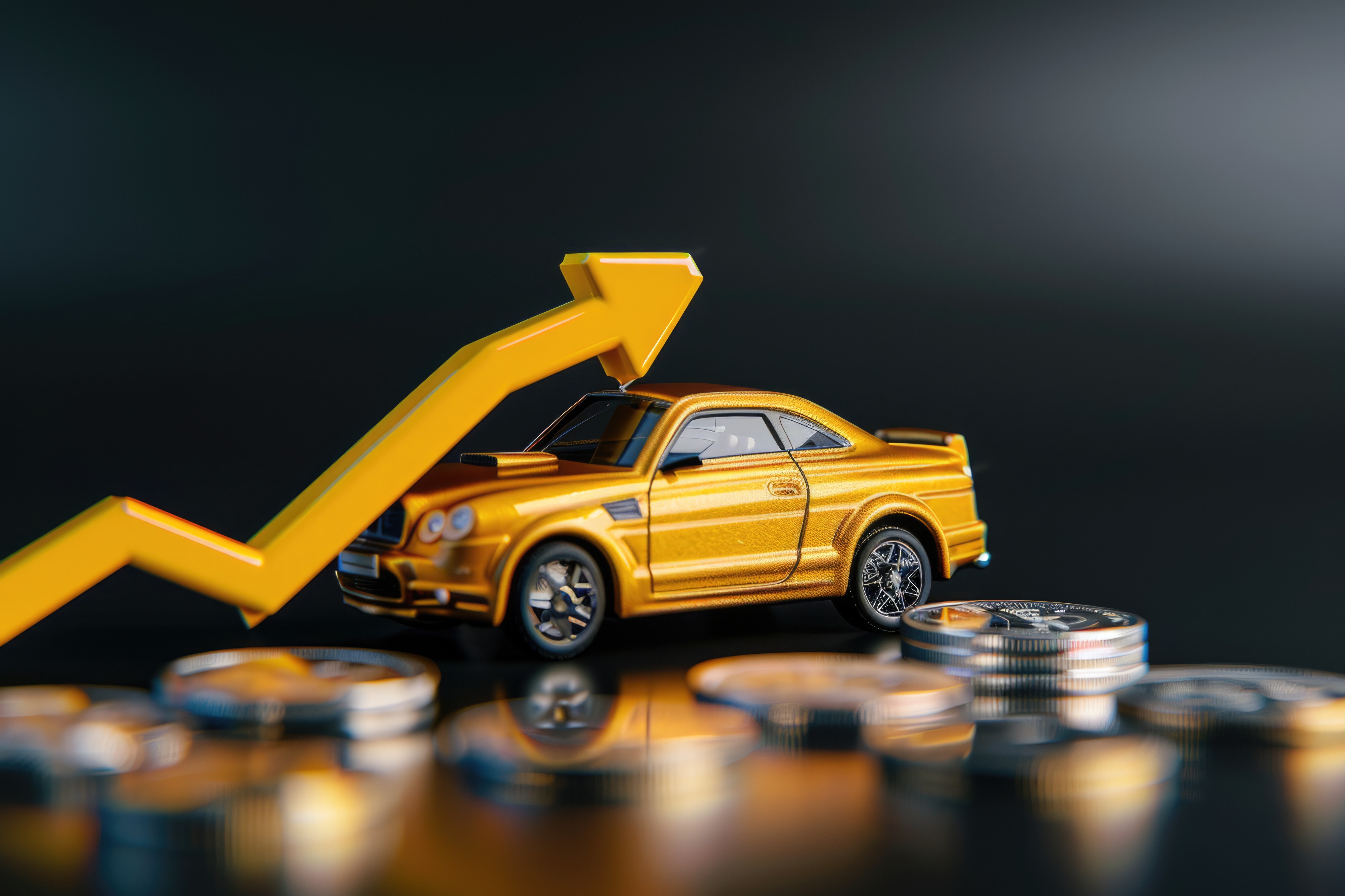a yellow arrow rising on top of yellow toy car