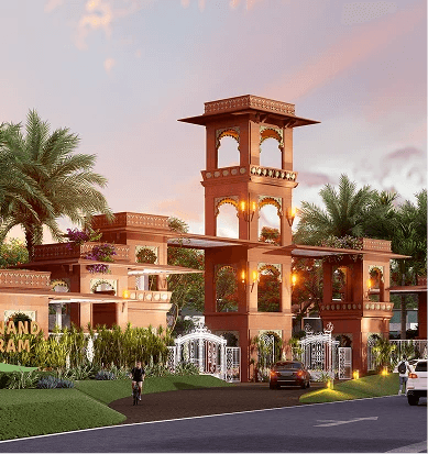 Modern suburban house with tan siding and stone accents at dusk.