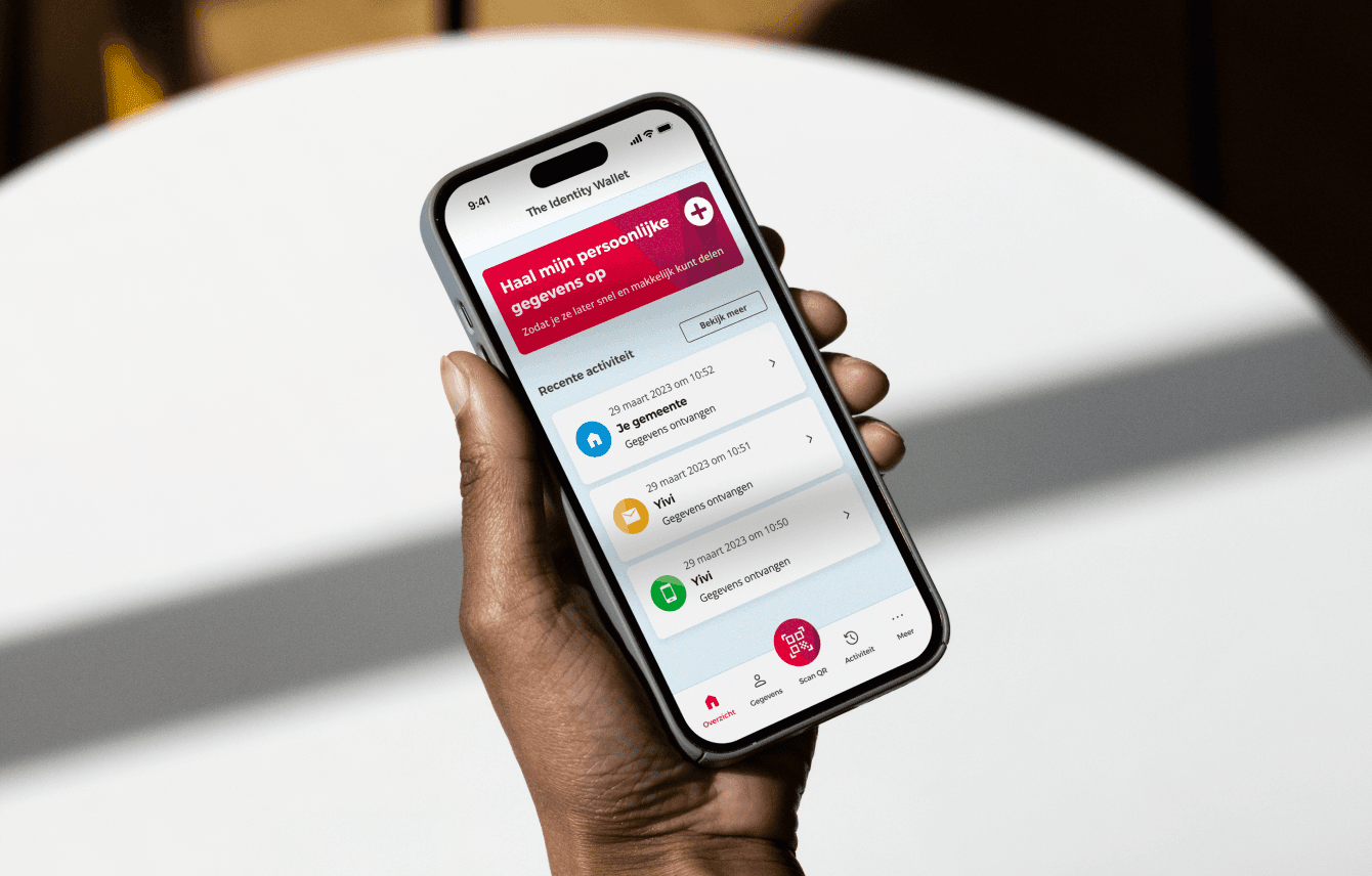 YIVI – SIDN — hand holding a smartphone showing the YIVI digital identity app interface — Soda Studio case study