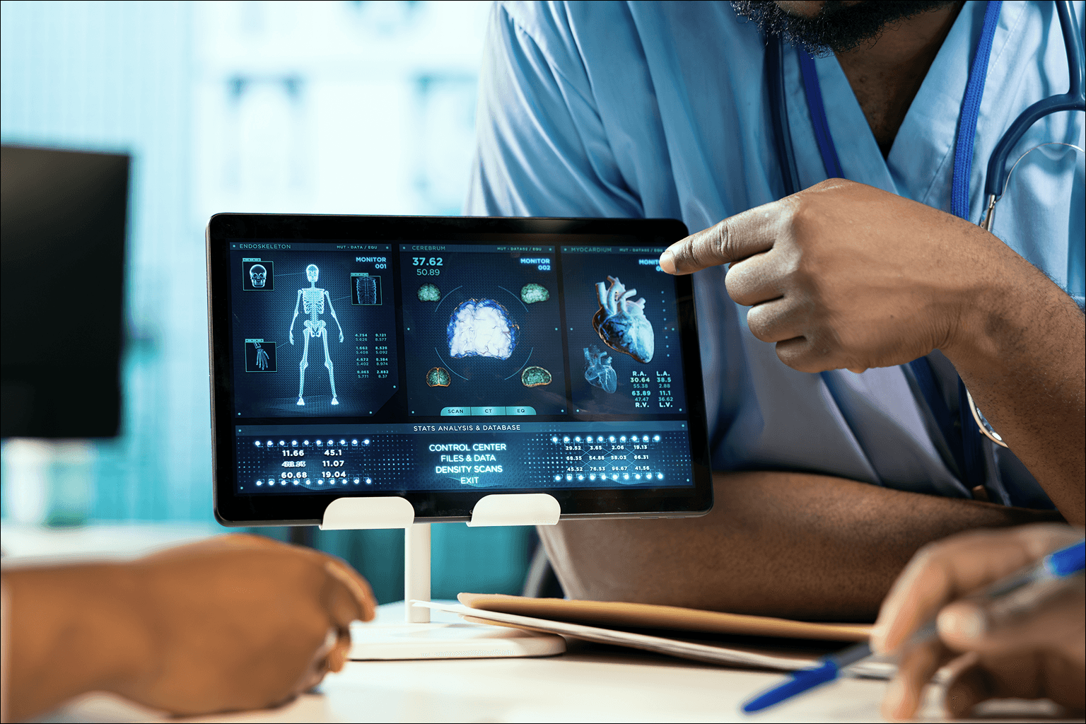 A clinician reviewing digital medical data on a tablet, illustrating the importance of IEC 62304 compliance in ensuring safe and reliable medical software.