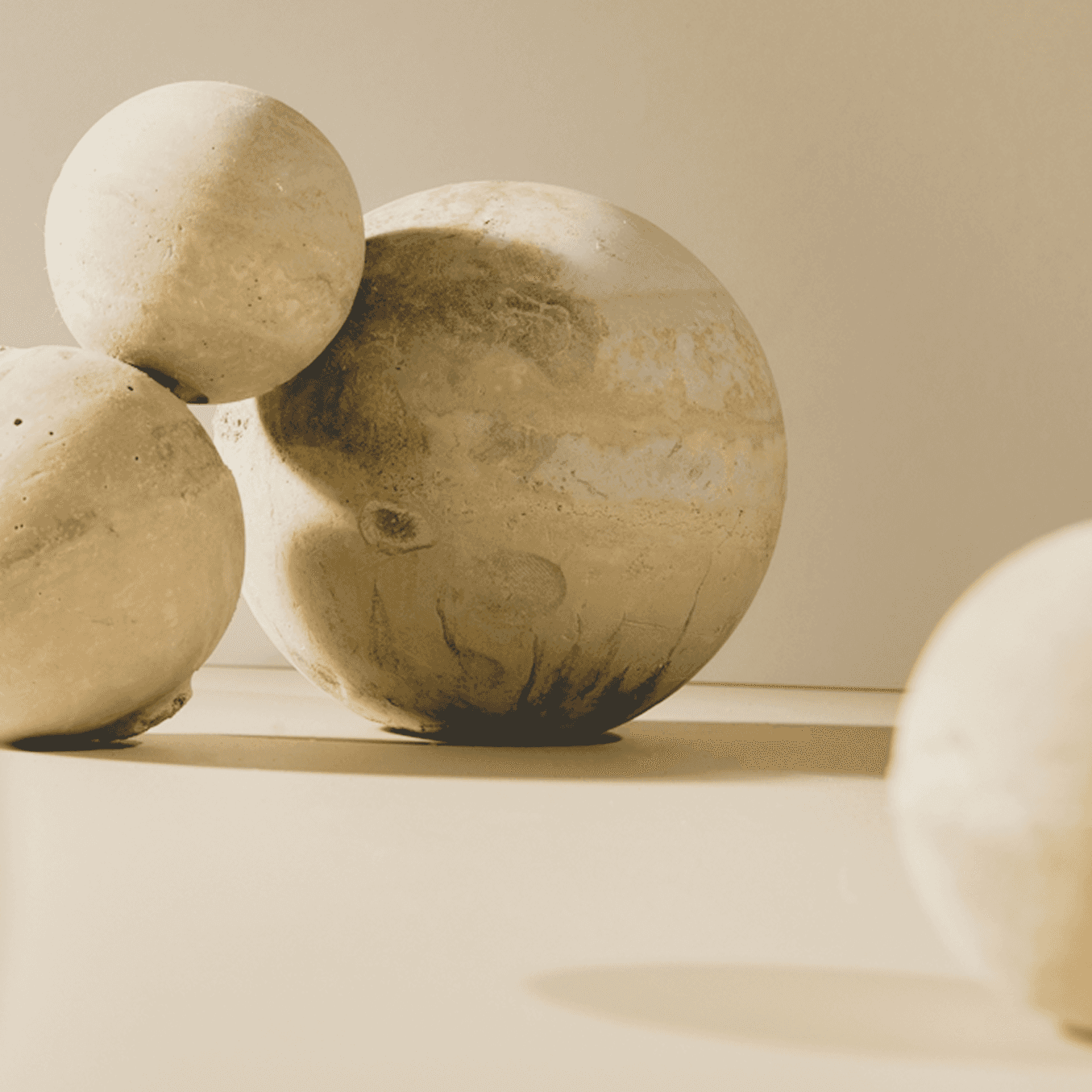 Silhouette of a researcher examining a slide under a microscope with a blue background.