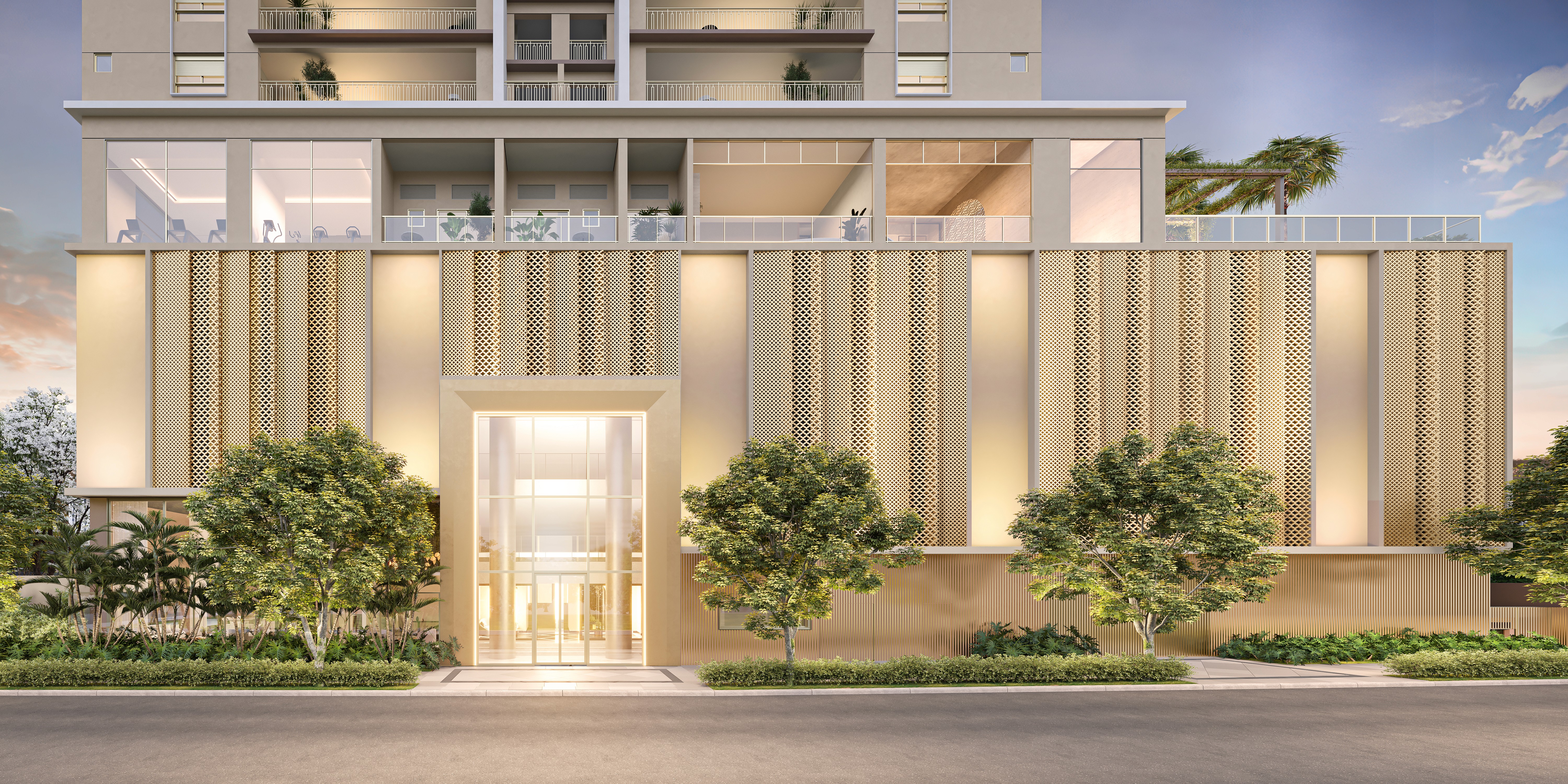 Curved modern skyscraper against a clear blue sky.