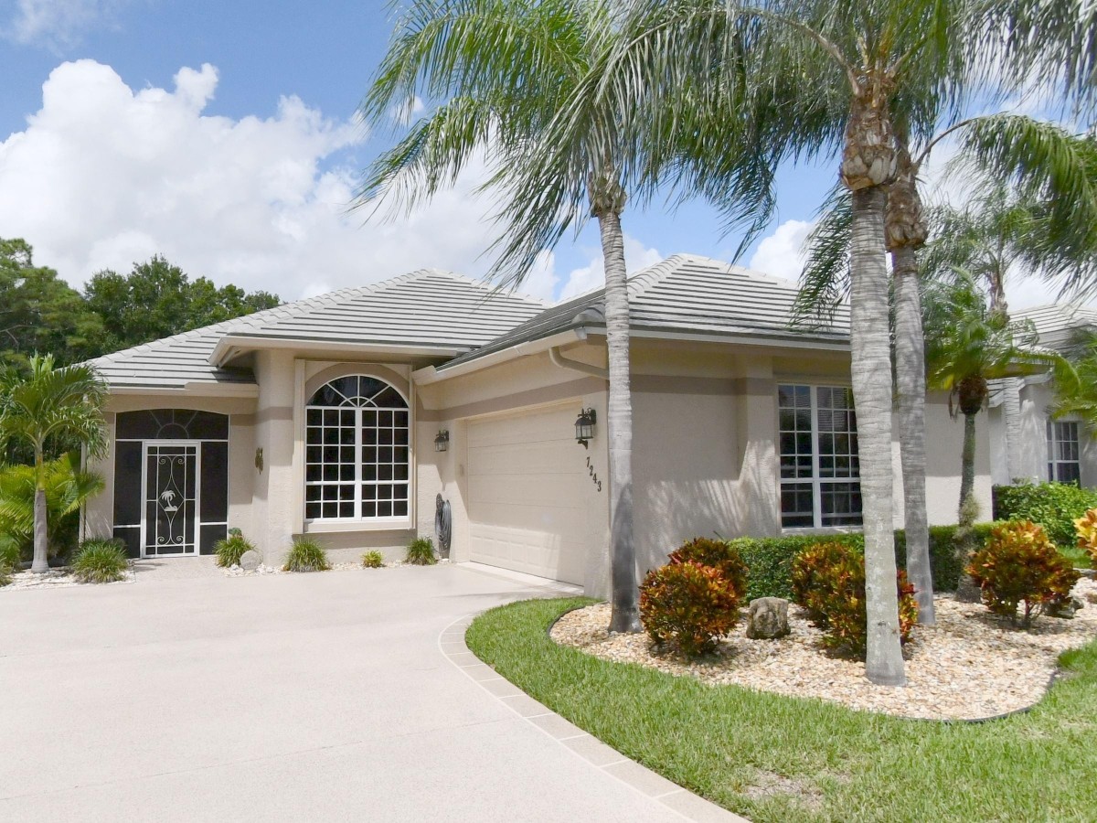 1994 New Roof Construction in Marsh Landing, PGA Village, Port St Lucie with Entegra Flat Broomswept Tile in Natural Gray