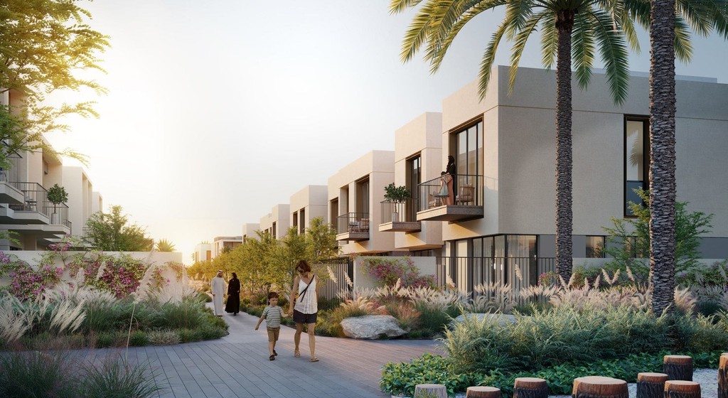 Aerial view of Orania The Valley, a new villa community in Dubai, highlighting its elegant homes and green surroundings.