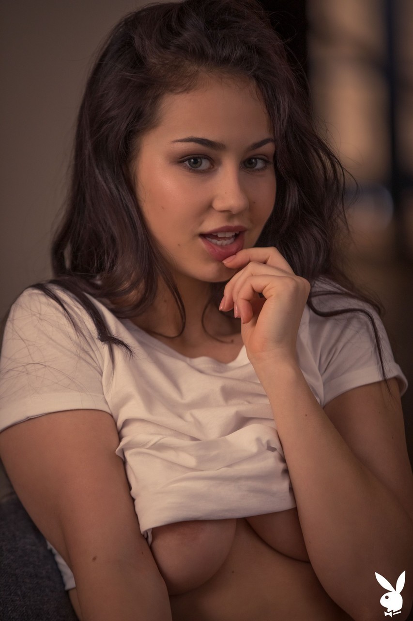 kids lying on a glass land and smiling