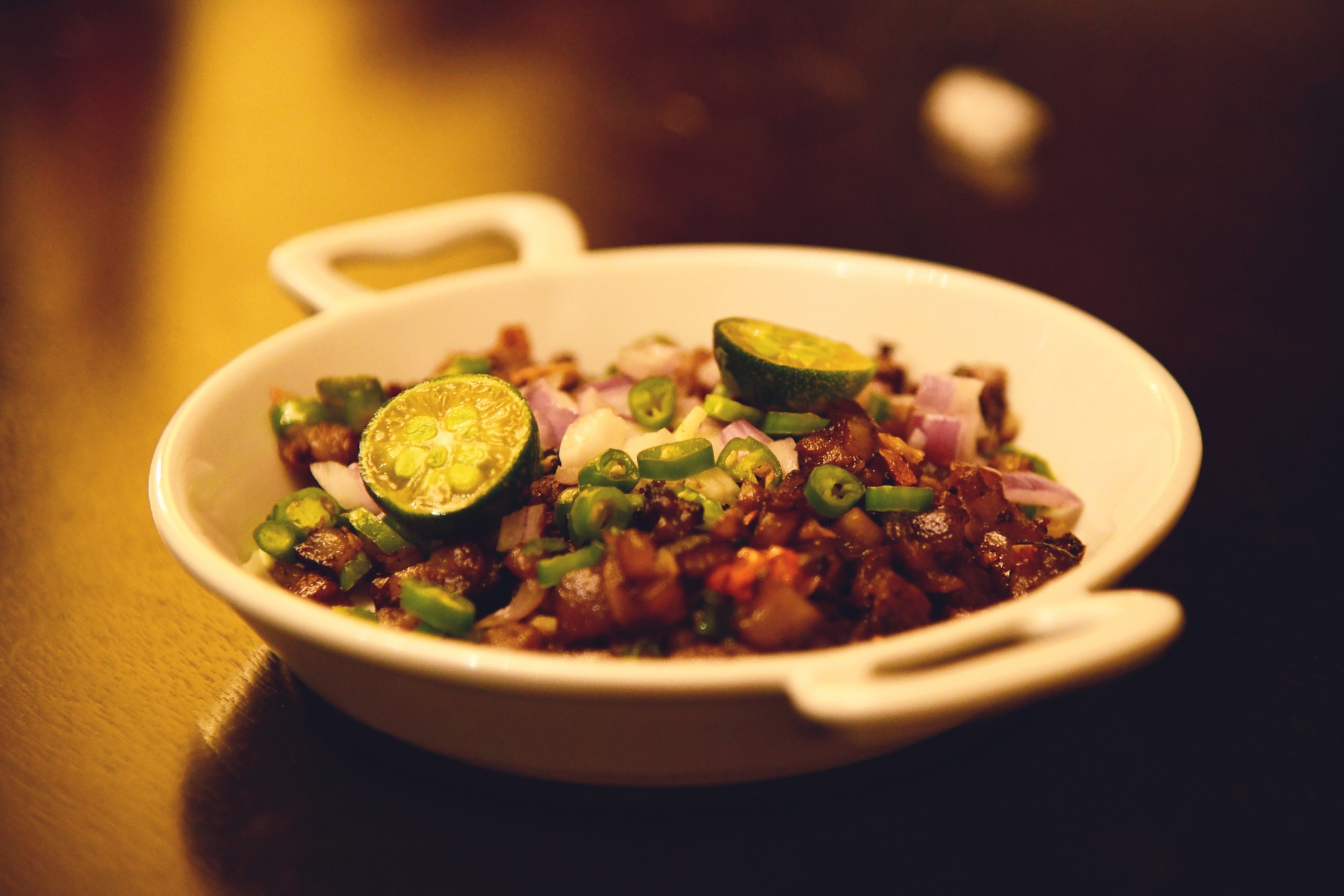 Shrimp ceviche with lime and toasted bread.