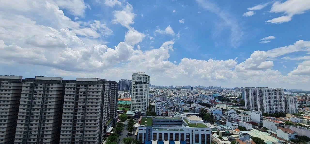 Luxury living room with floor-to-ceiling windows and panoramic sea view.