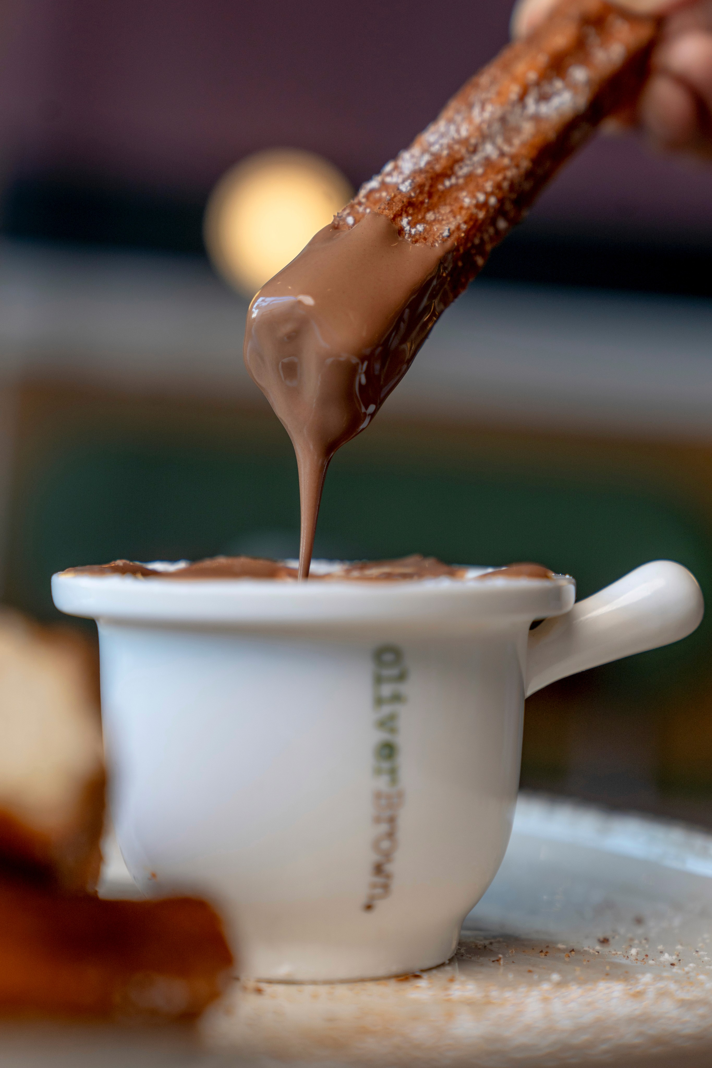 Churros Dipped in Liquiud Chocolate