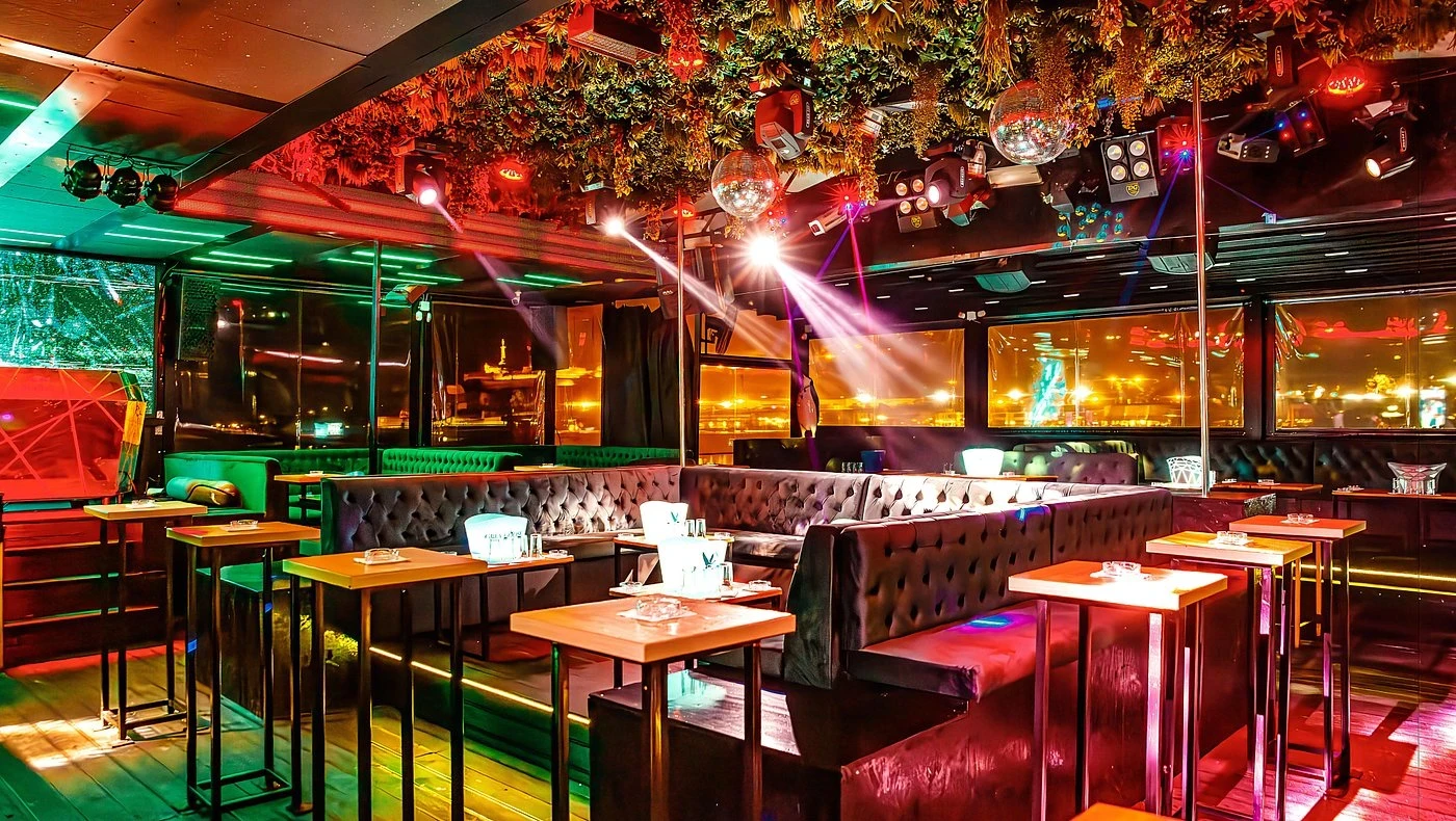 Splav Tag nightclub interior with dance floor and DJ stage, located in Belgrade, Serbia