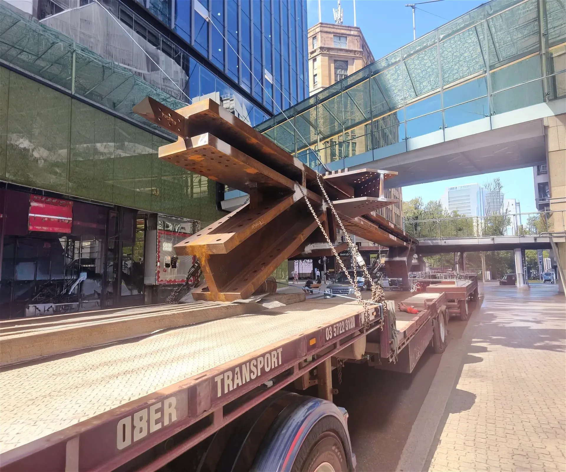Large steel beams on a transport truck