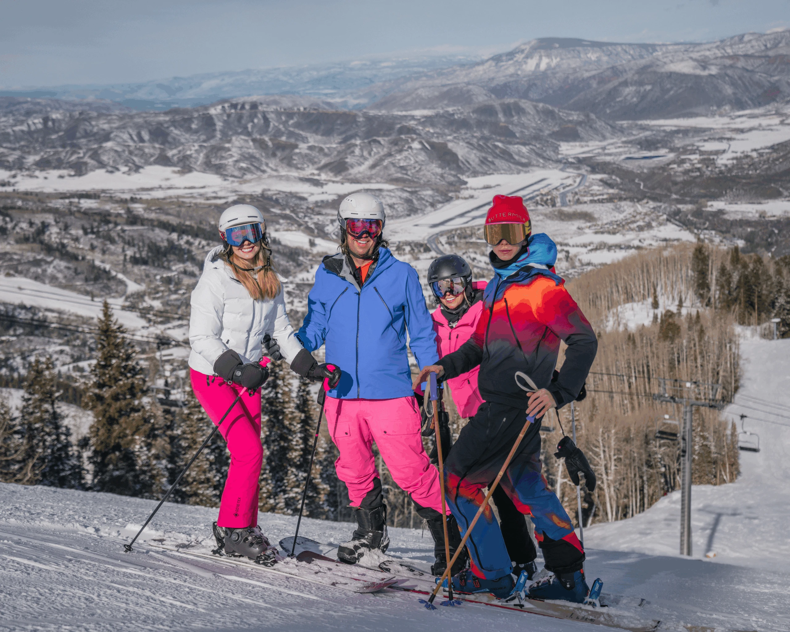 Aspen ski photographer capturing a family celebrating together on the slopes
