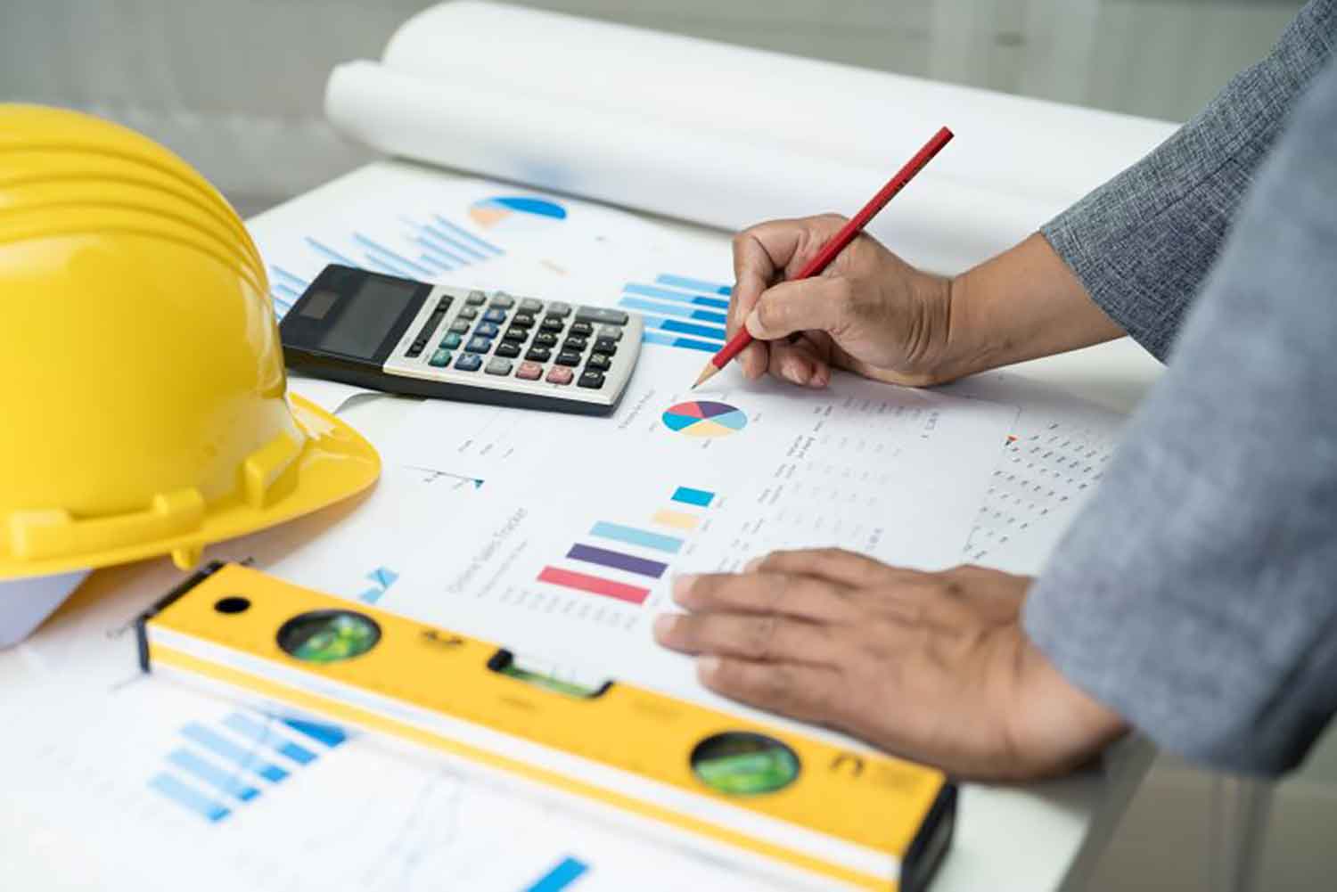 A man and a robot shaking hands over a cityscape, symbolizing a successful business partnership.