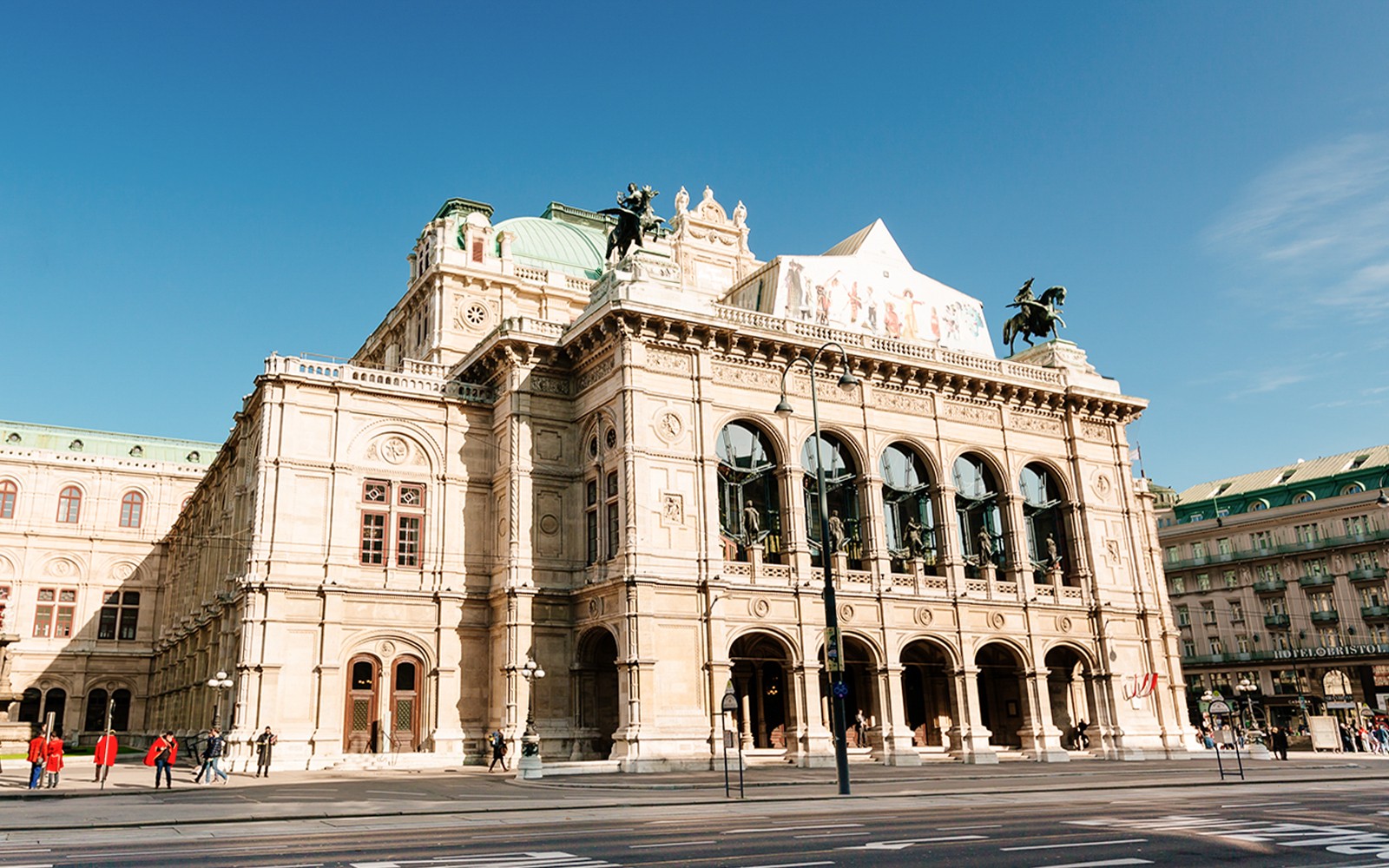 Vienna State Opera building on a sunny day during the Schönbrunn & city tour.