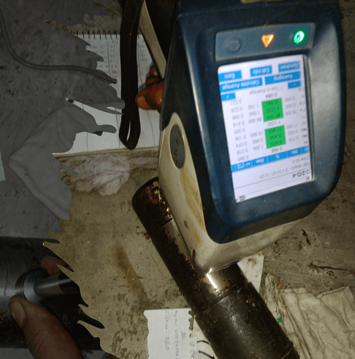 Metal springs are stacked in a warehouse.