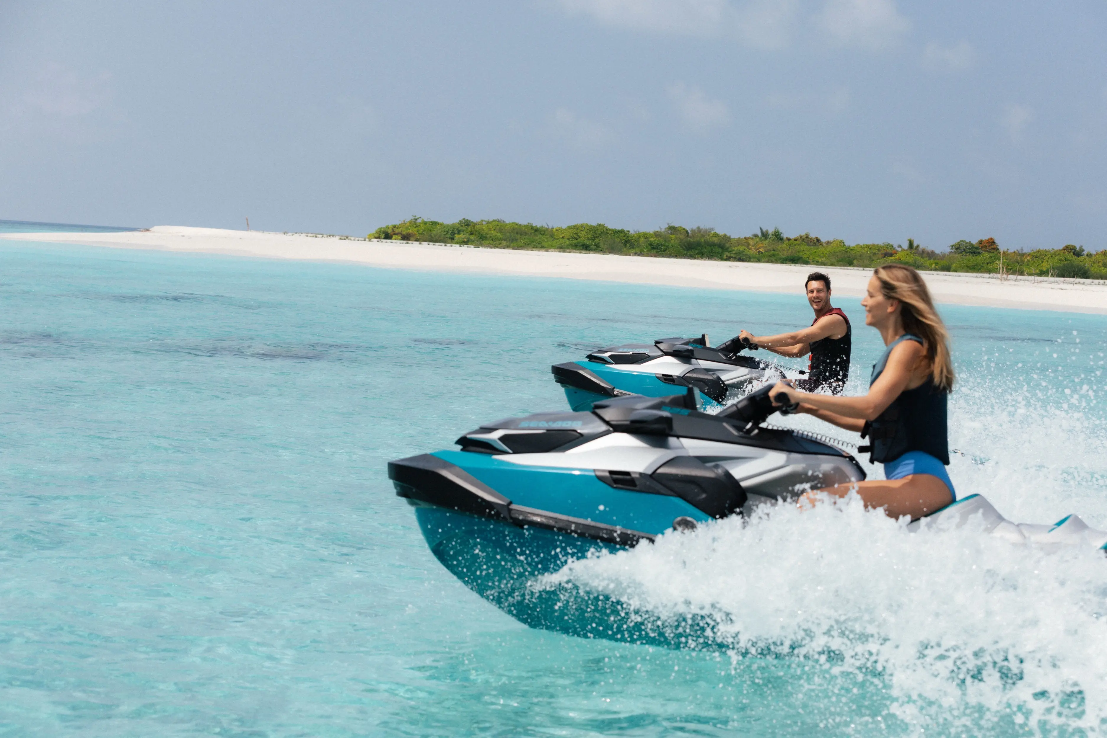 Guests on jet skis at Velaa