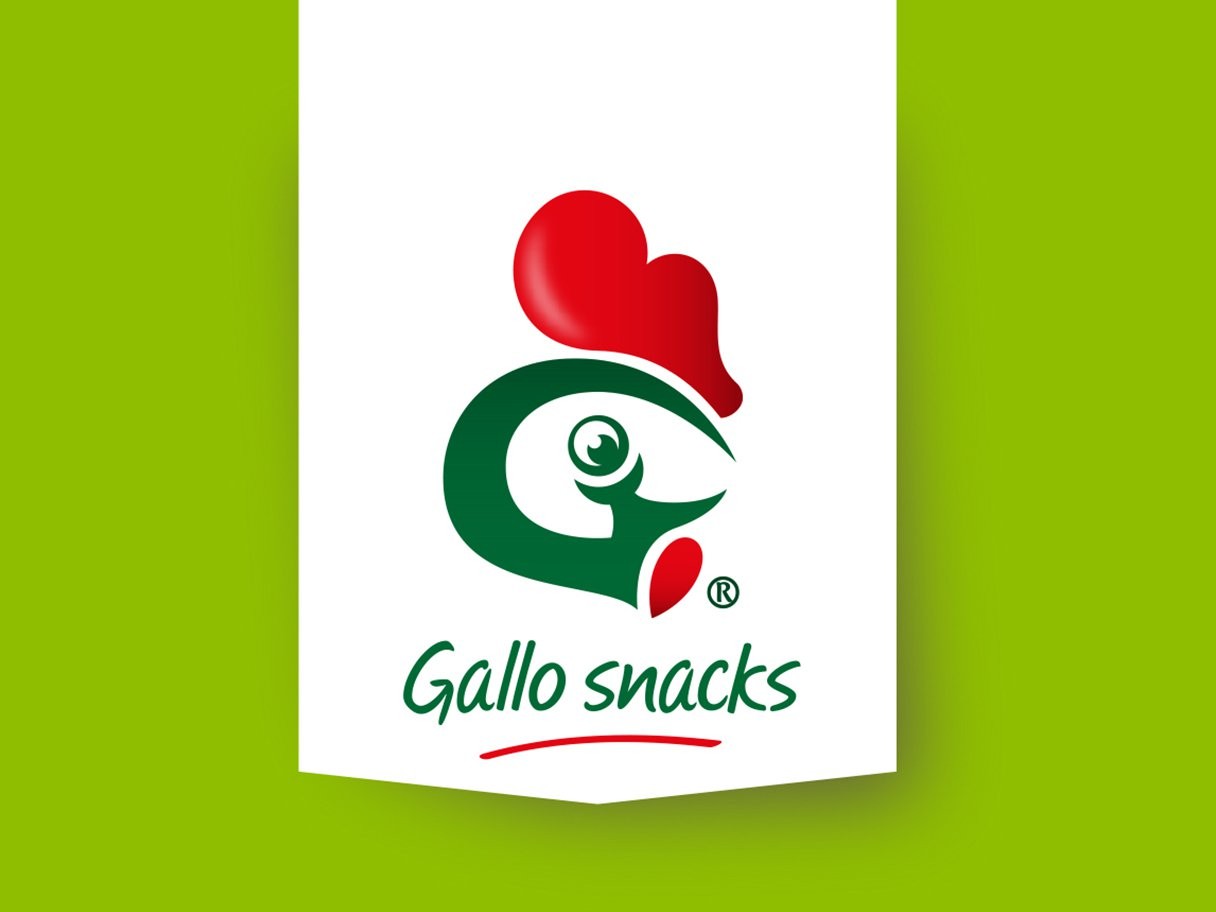 Rooftops of a coastal town with the sea in background