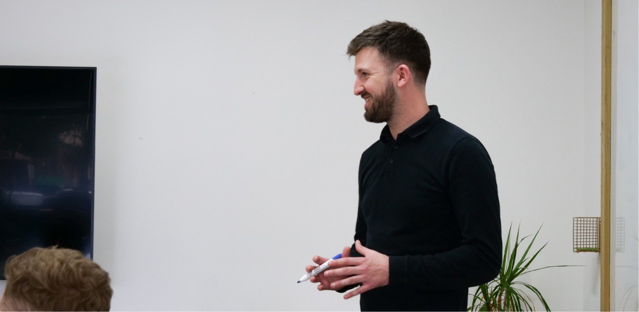 A person playing a game with remote controllers.