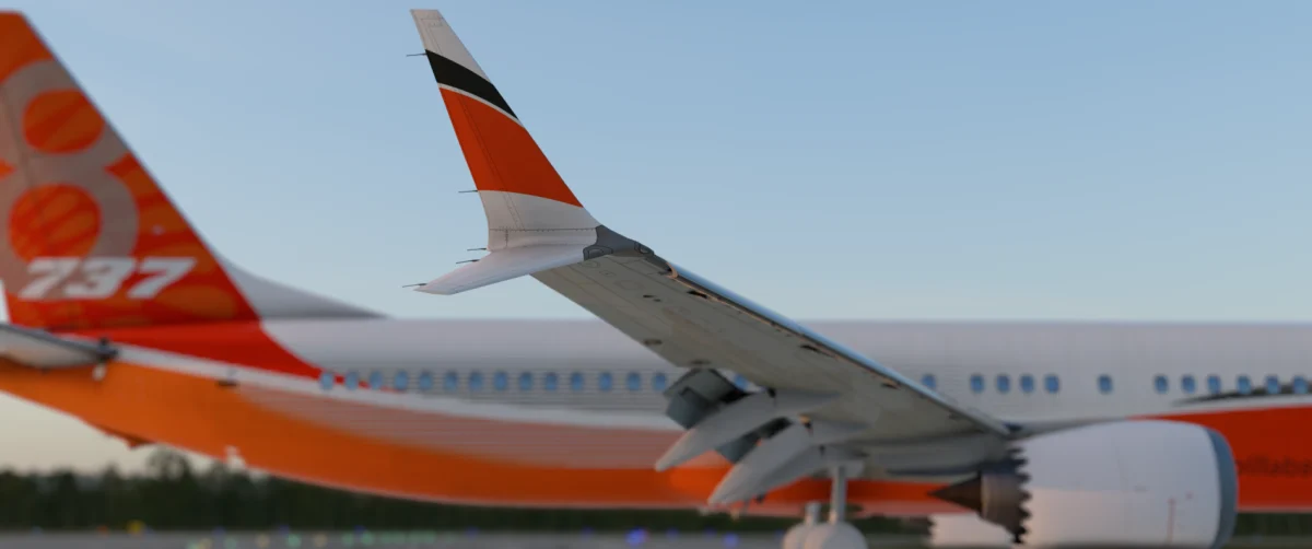 AFL 737 MAX winglet and wing close-up with the orange tail in the background