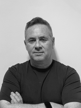 Black and white image of Jason Flynn.