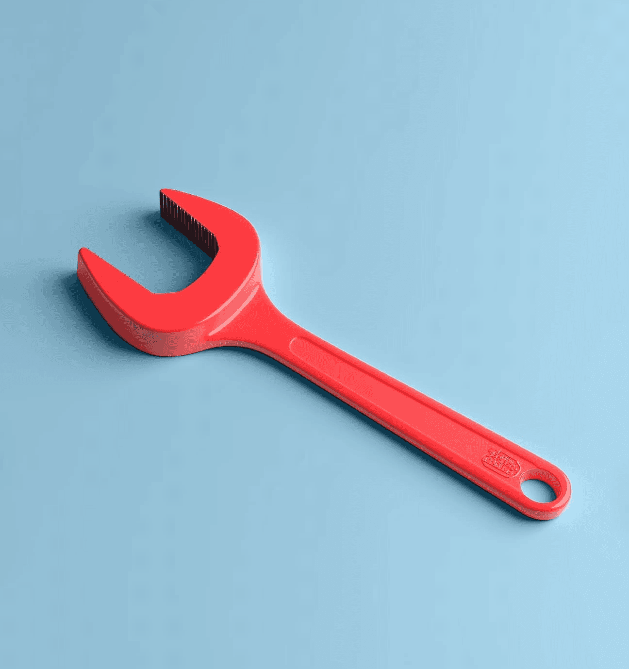 3D illustration of a red wrench on a blue background, symbolizing the practical tools and resources available to support communication success.