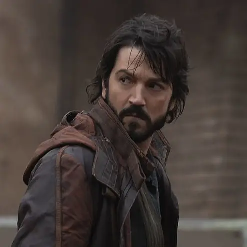 Cassian Andor looking back over his shoulder in a jacket