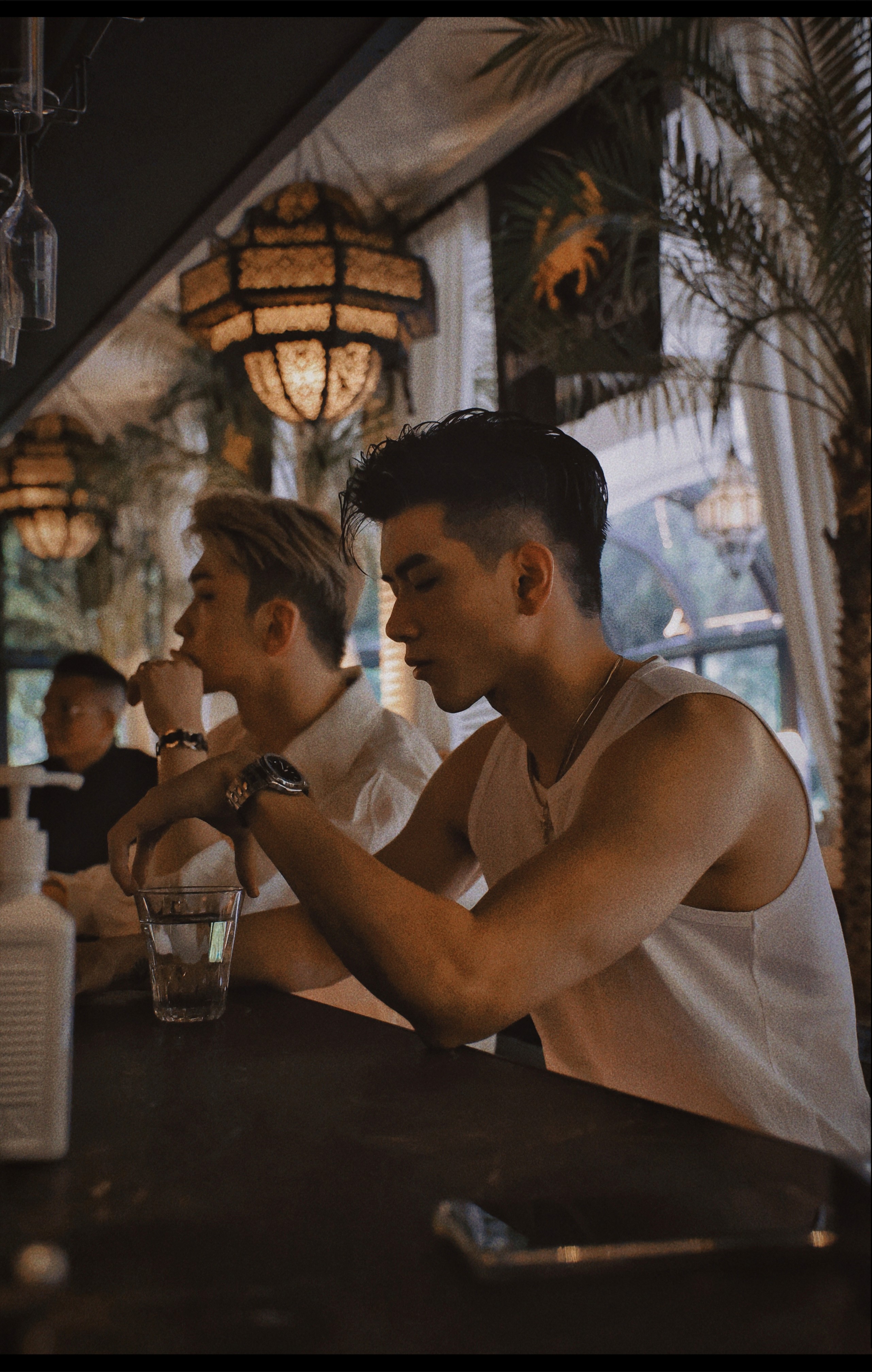 Man kneeling in studio