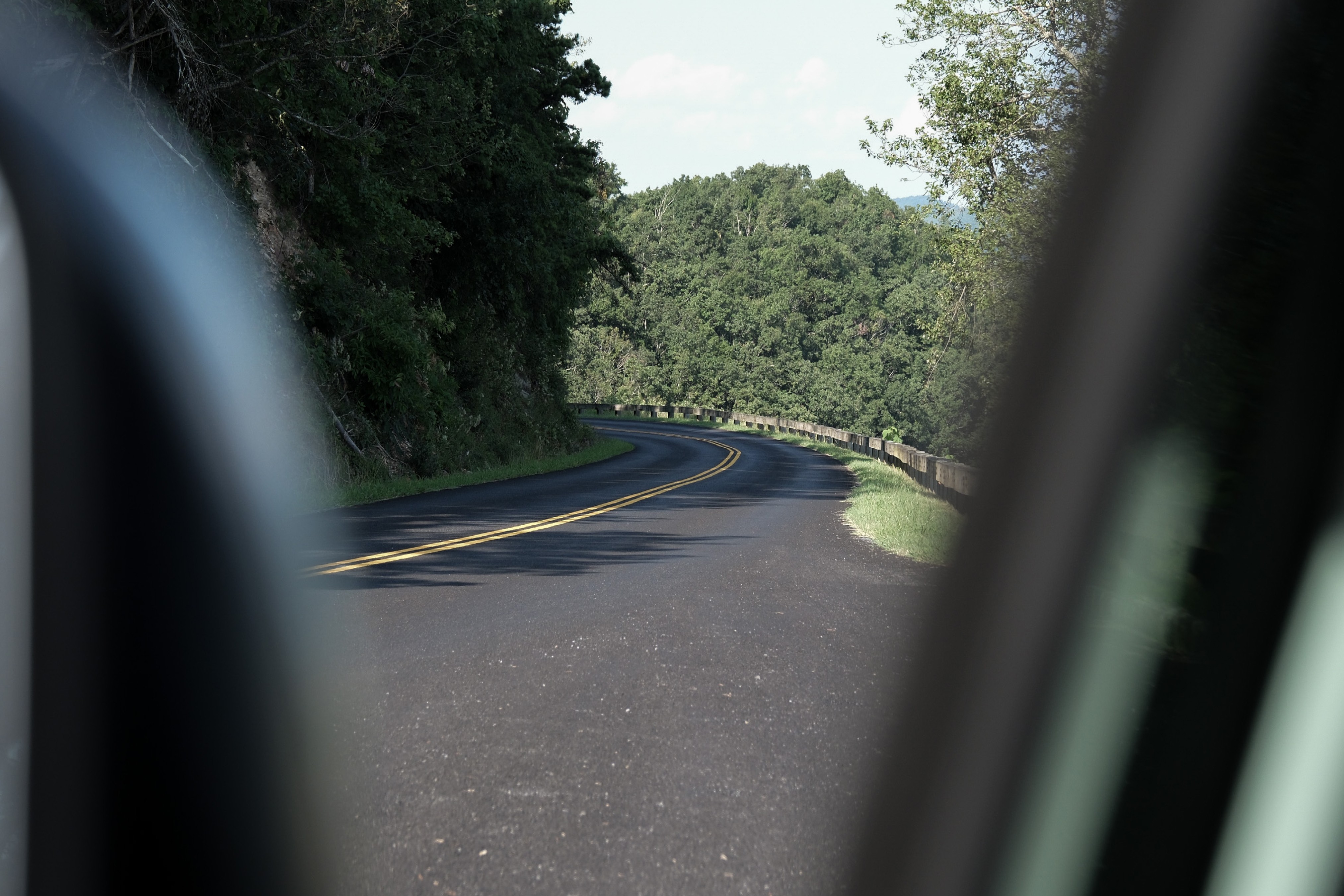 Streetside billboard with flyposters of the Batch.Works brand and illustrations