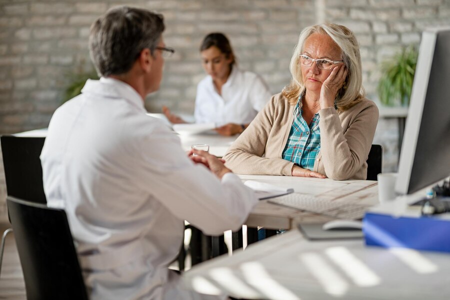 A patient consulting with her doctor over her behavioral problems.