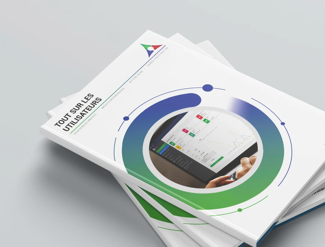 Mockup pile de guides utilisateur AniKit empilés en angle — couverture "Tout sur les Utilisateurs" avec visuel circulaire bleu-vert et capture plateforme, conception onboarding industriel par Tartelette Concept