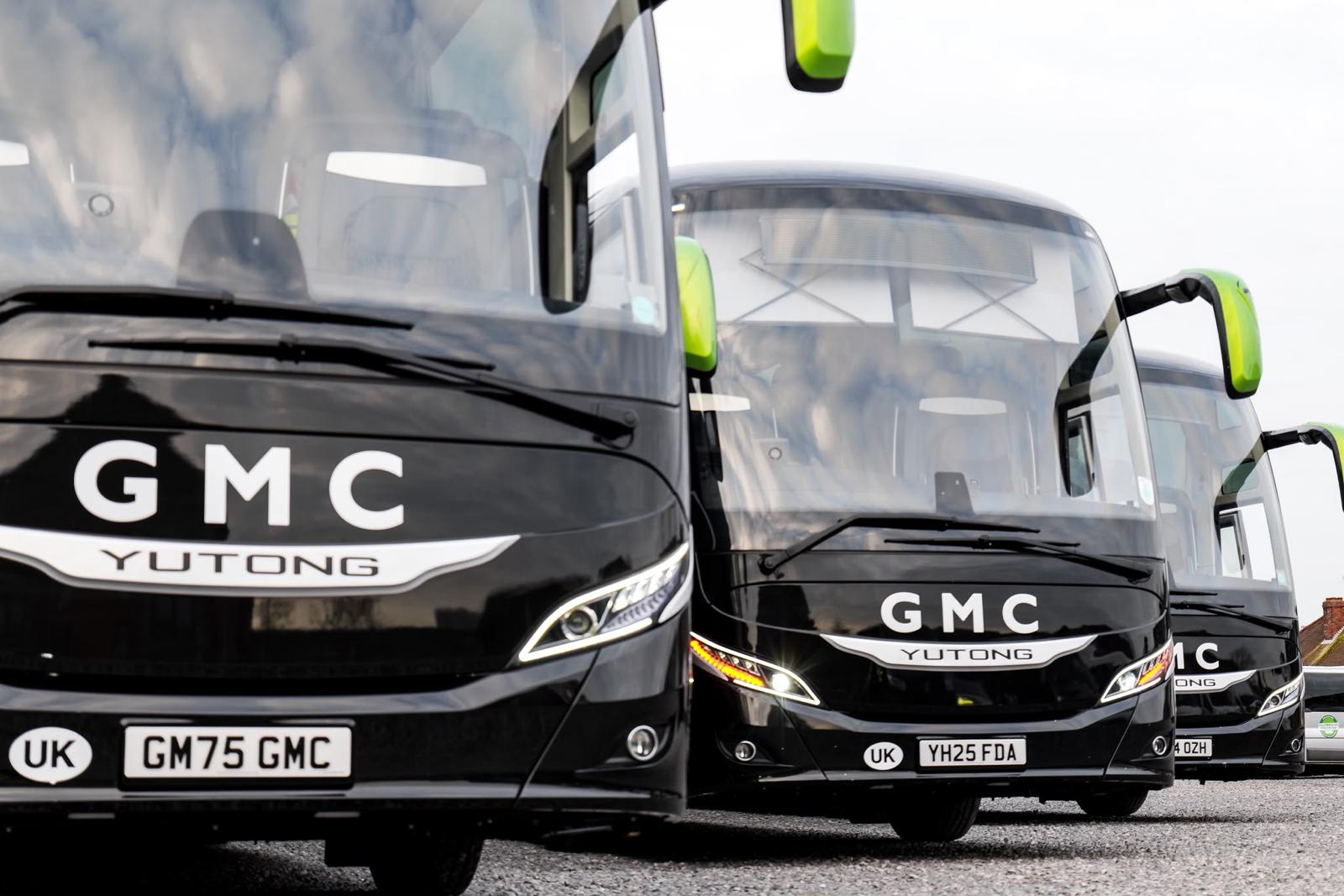 Green Metro Coaches black Yutong coaches with green mirrors.