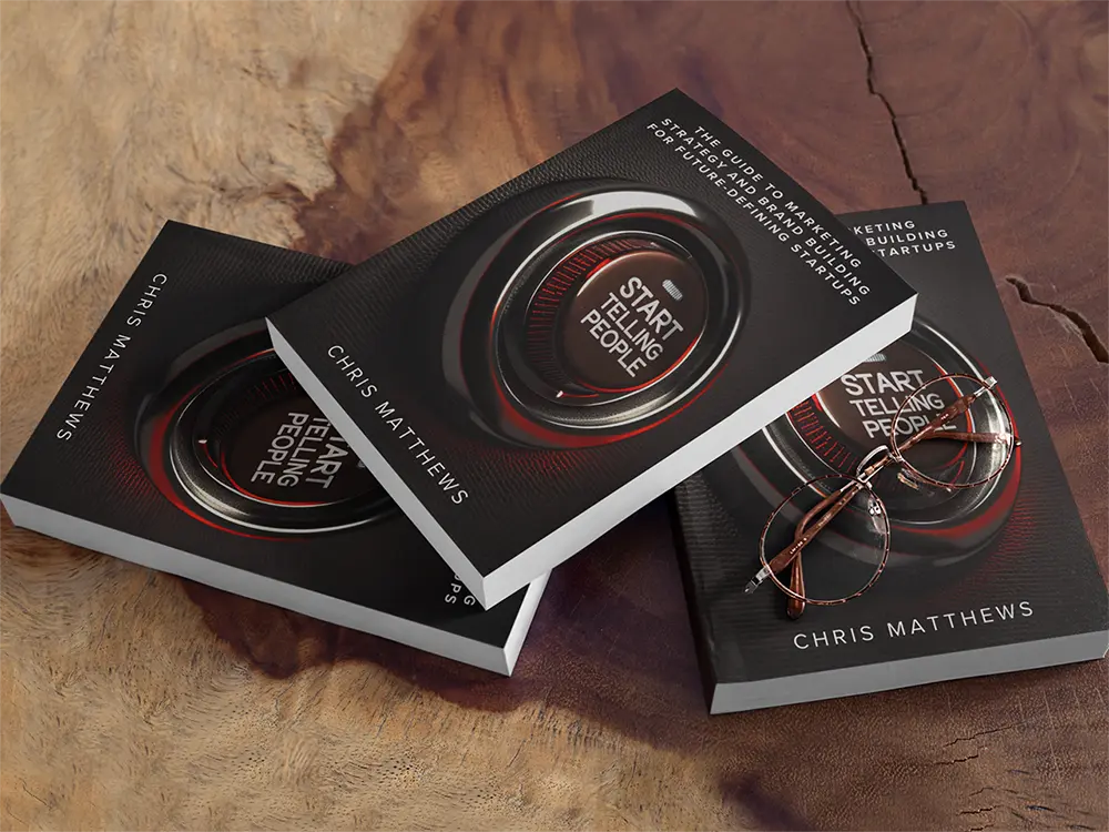 Start Telling People books on table