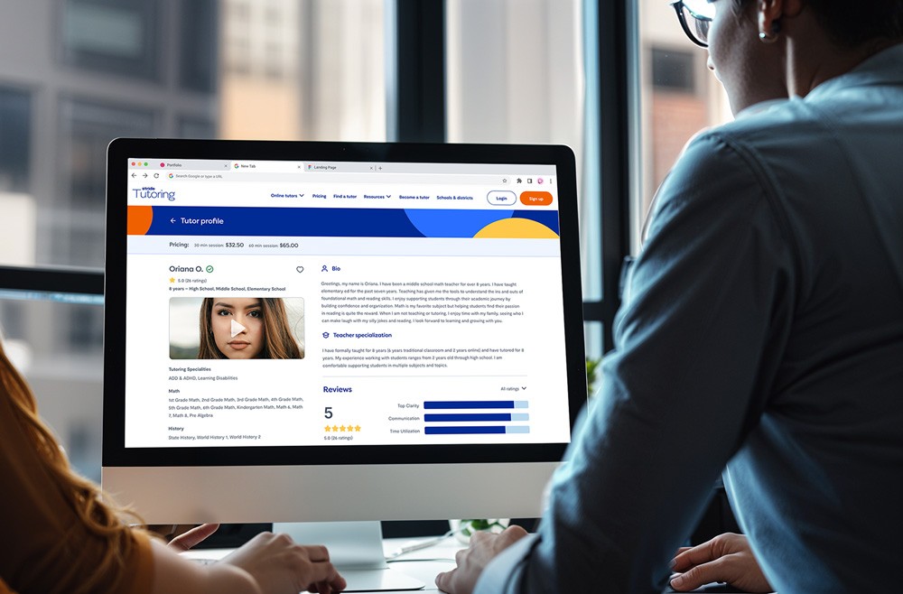 2 team members collaborating on a design for Tallo.