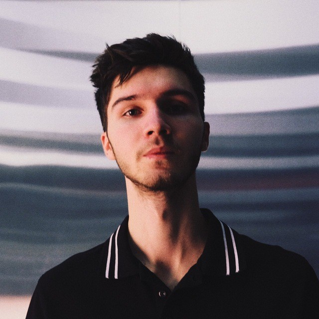 man in black zip up jacket