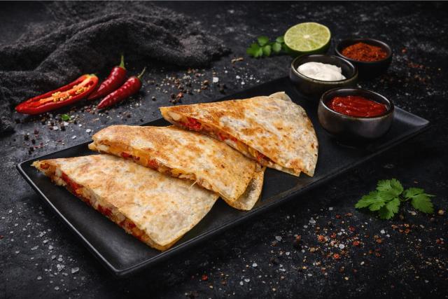 cheese burger on a wooden surface