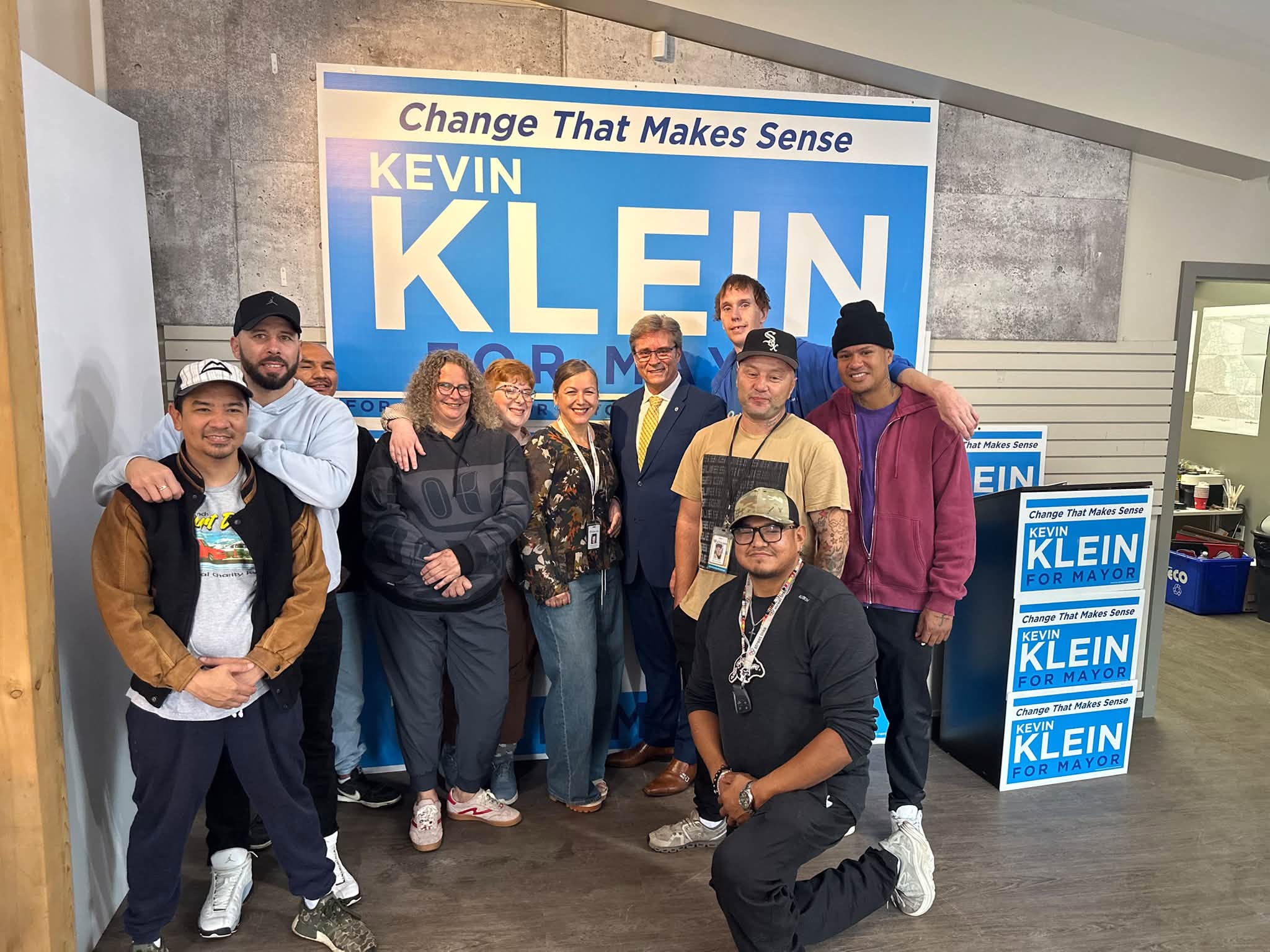 Winnipeg mayoral candidate Kevin Klein with members of the St. Boniface Street Links as he announces his “Safe Streets, Real Pathways Home Plan."