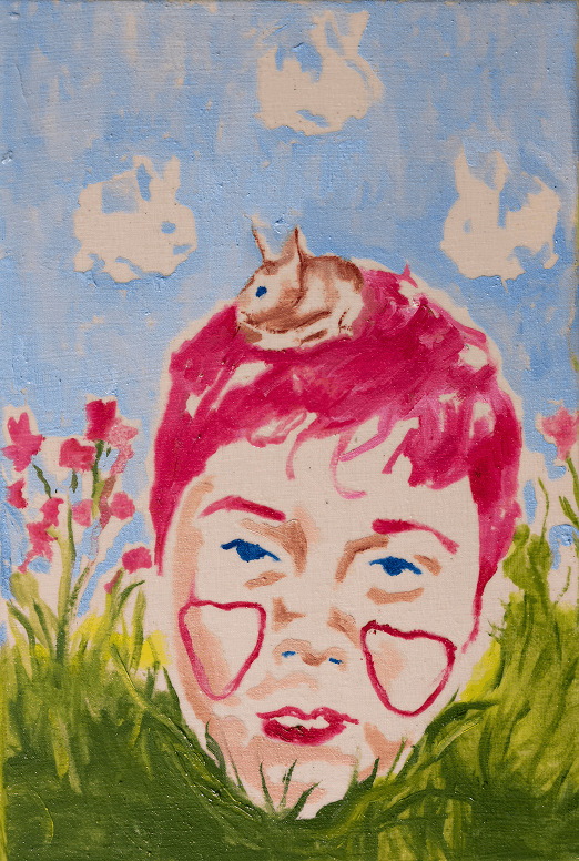 A man and woman setting up a tent next to a lake