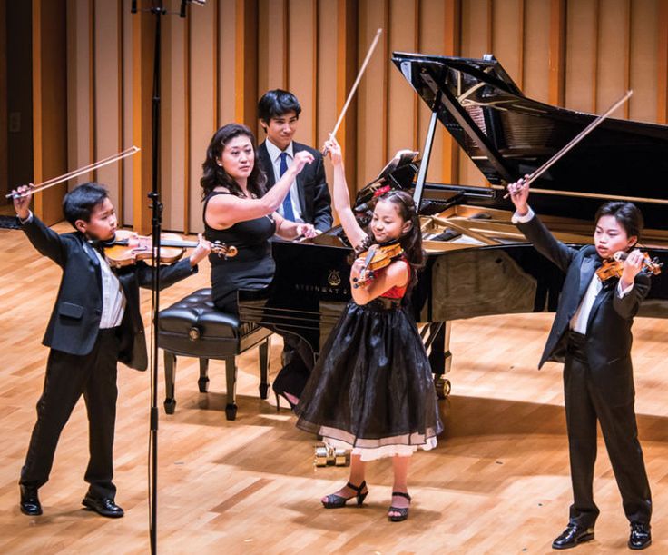 Abstract glowing orange book-shaped form on a dark background