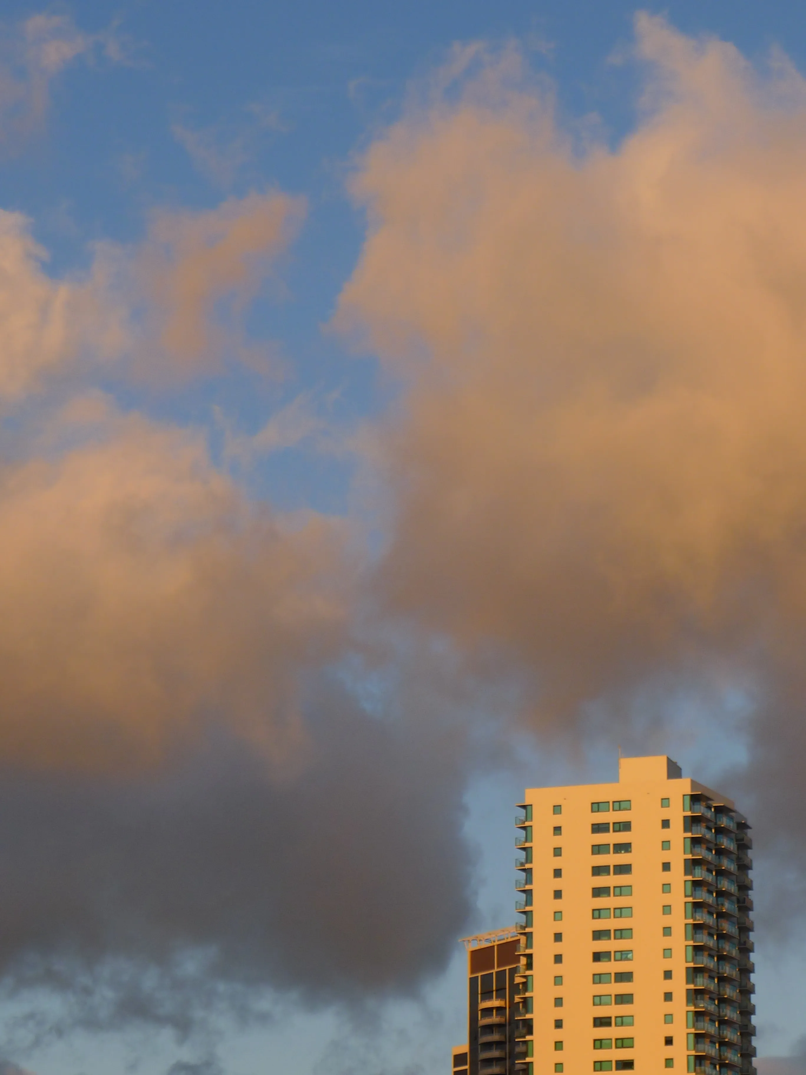 a picture of a skyscraper on a beautiful day