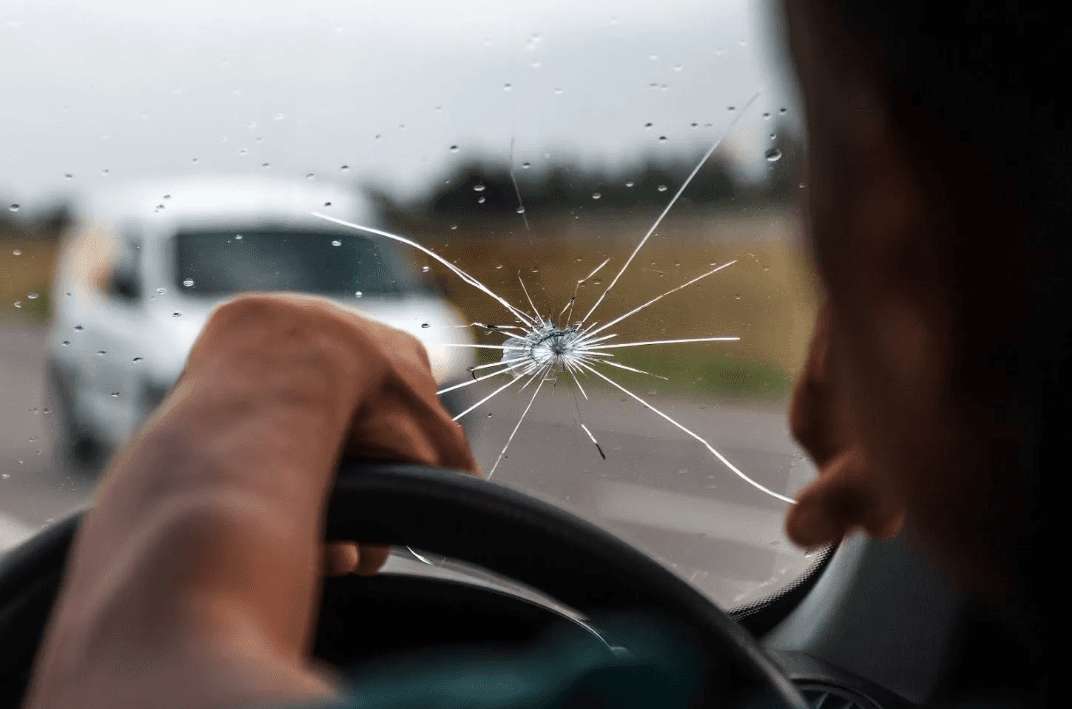 Shattered glass with a central impact point