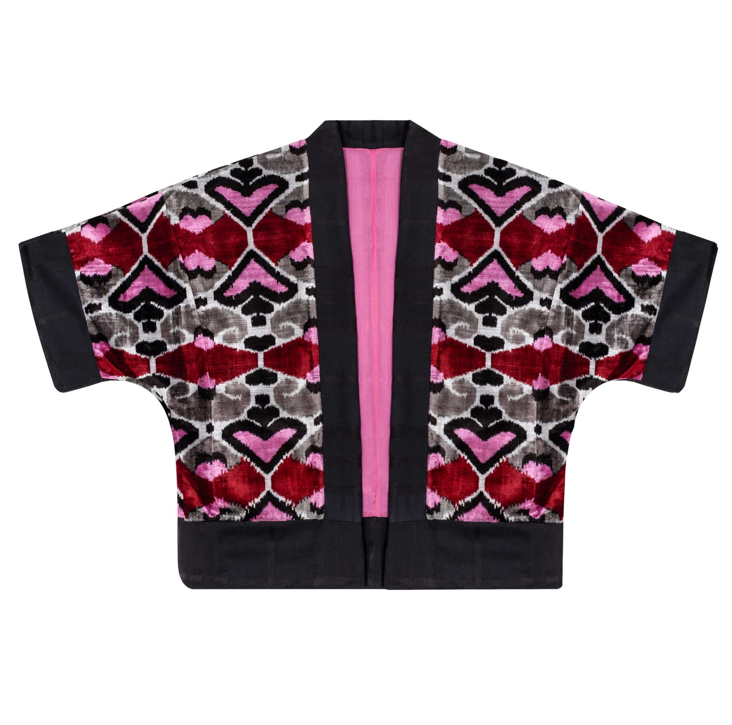 a cropped jacket with pink and red hearts