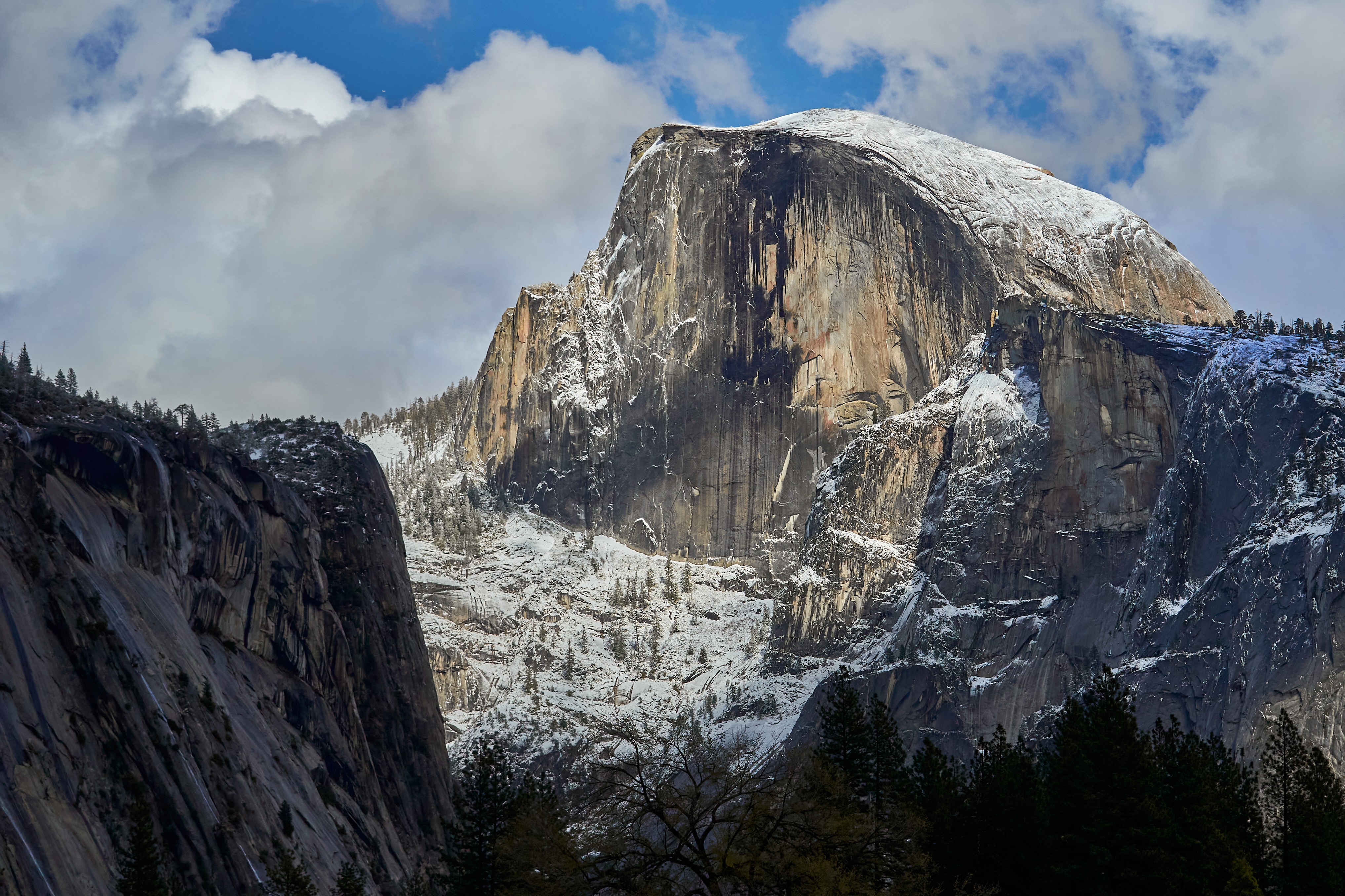 Half Dome at Yosemite National Park in the snow, Travel photographer USA, image by Paul Severn