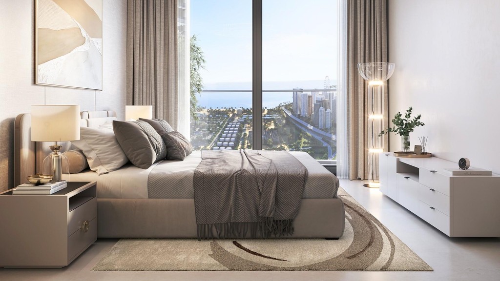 A chic bed room with a significant painting on the wall, representing the sophisticated ambiance of The Mirage at Sobha Central