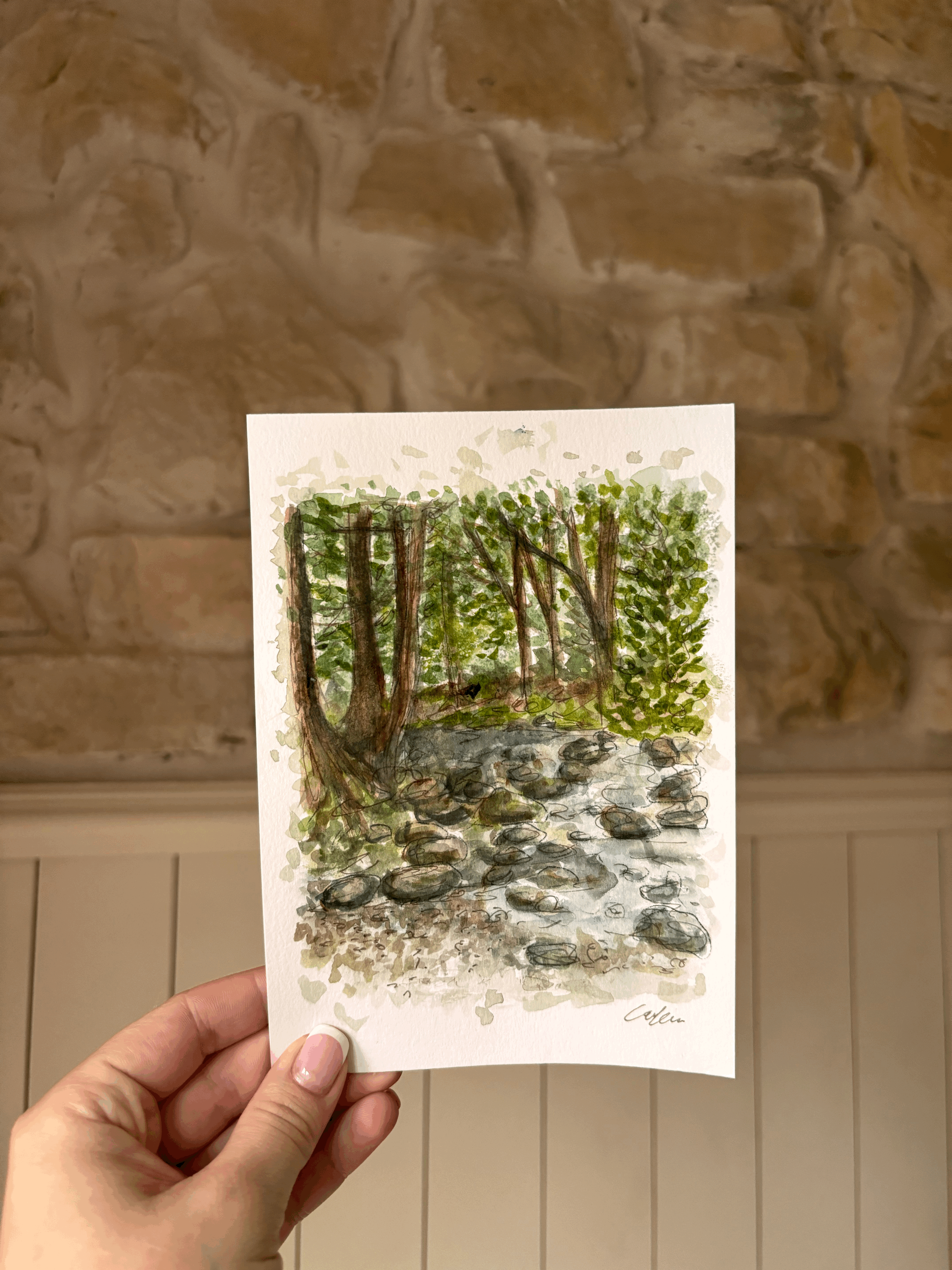 Looking up at a grand domed ceiling with columns