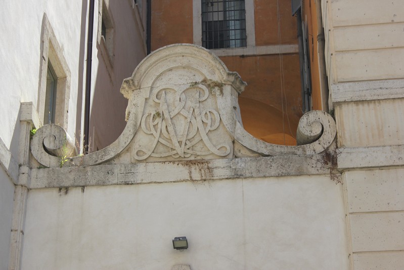 an emblem embossed as a building decoration