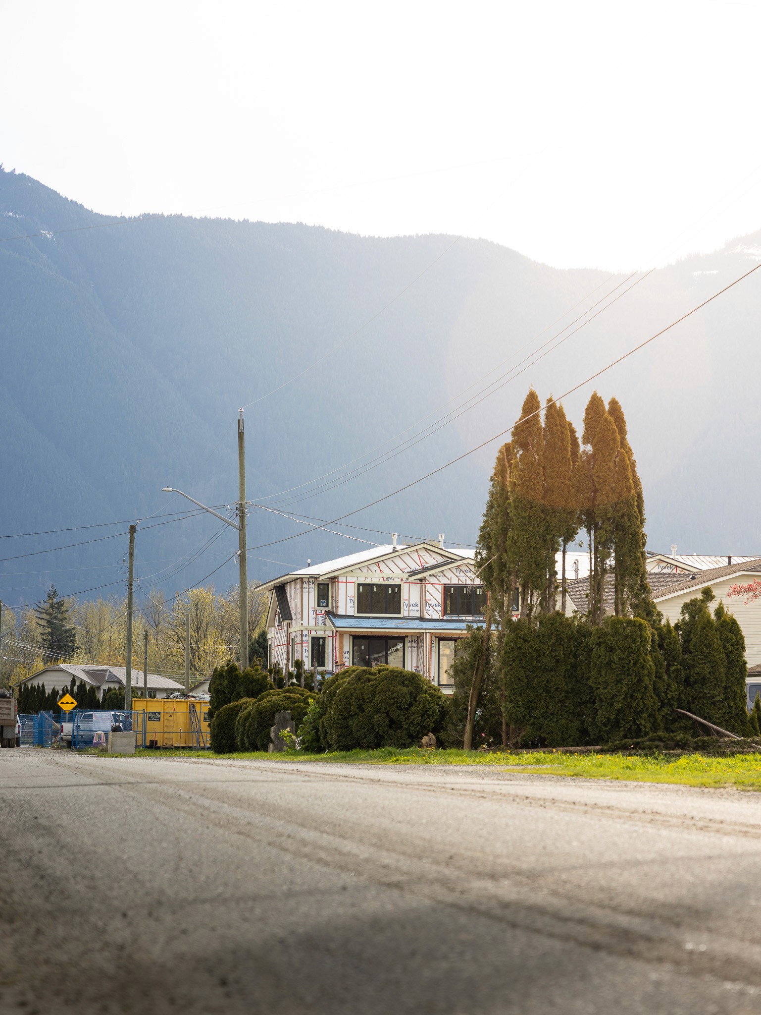 Seabird Island construction site in Agassiz, Fraser Valley, British Columbia, with trees and mountain views, needing plumbing and HVAC services.