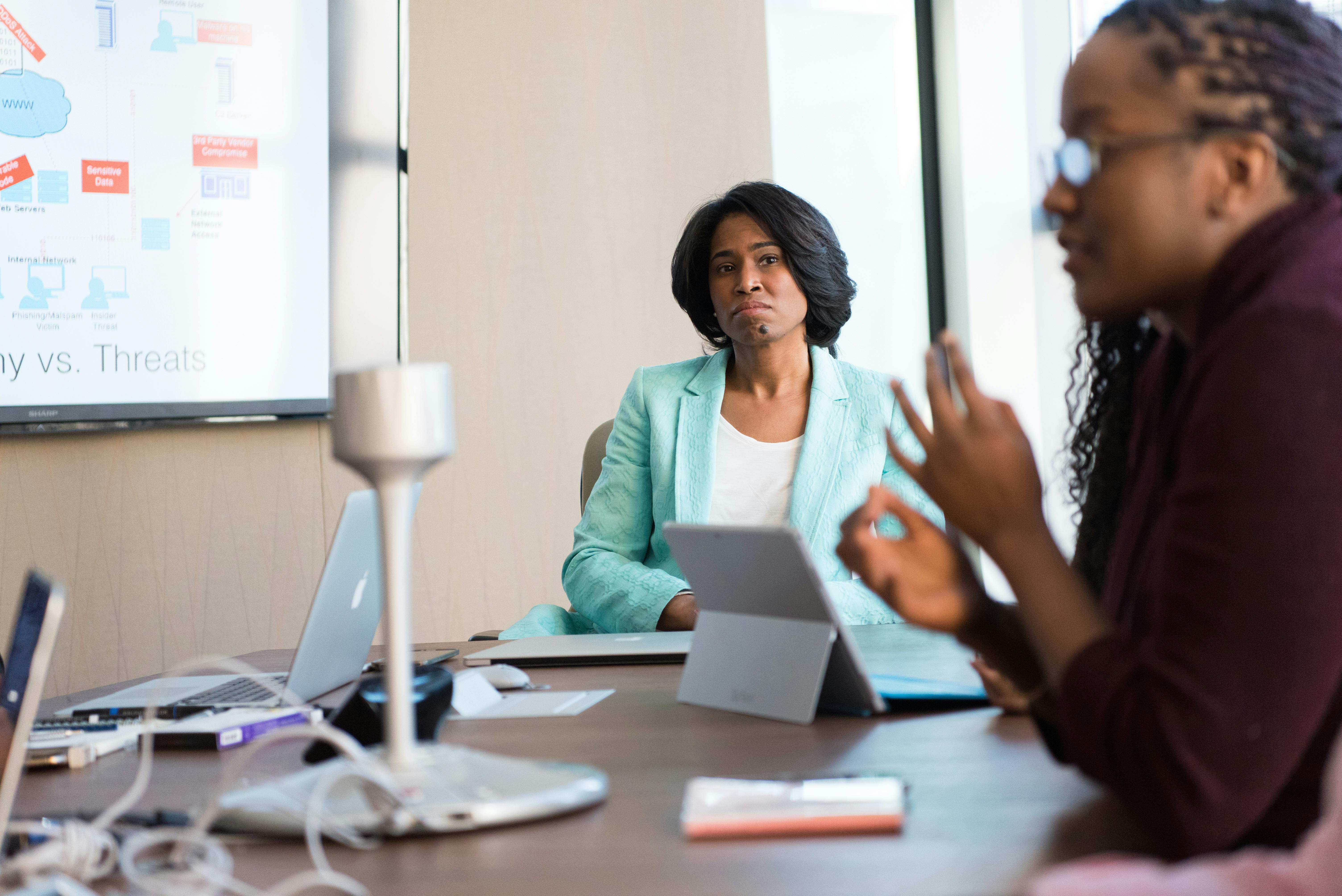 Two women having a meeting about email marketing