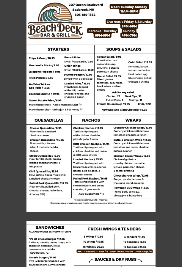 An elephant with large tusks in a lush green landscape.