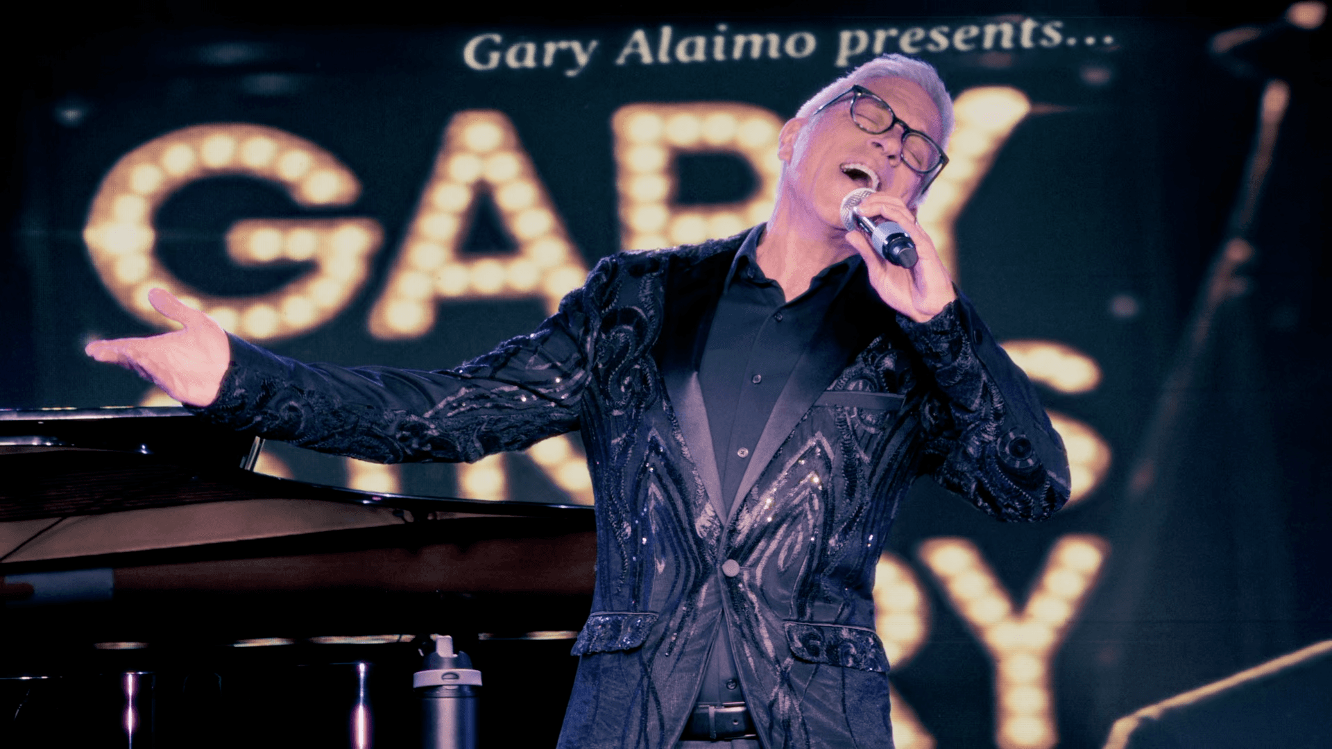 Gary Alaimo performing on stage