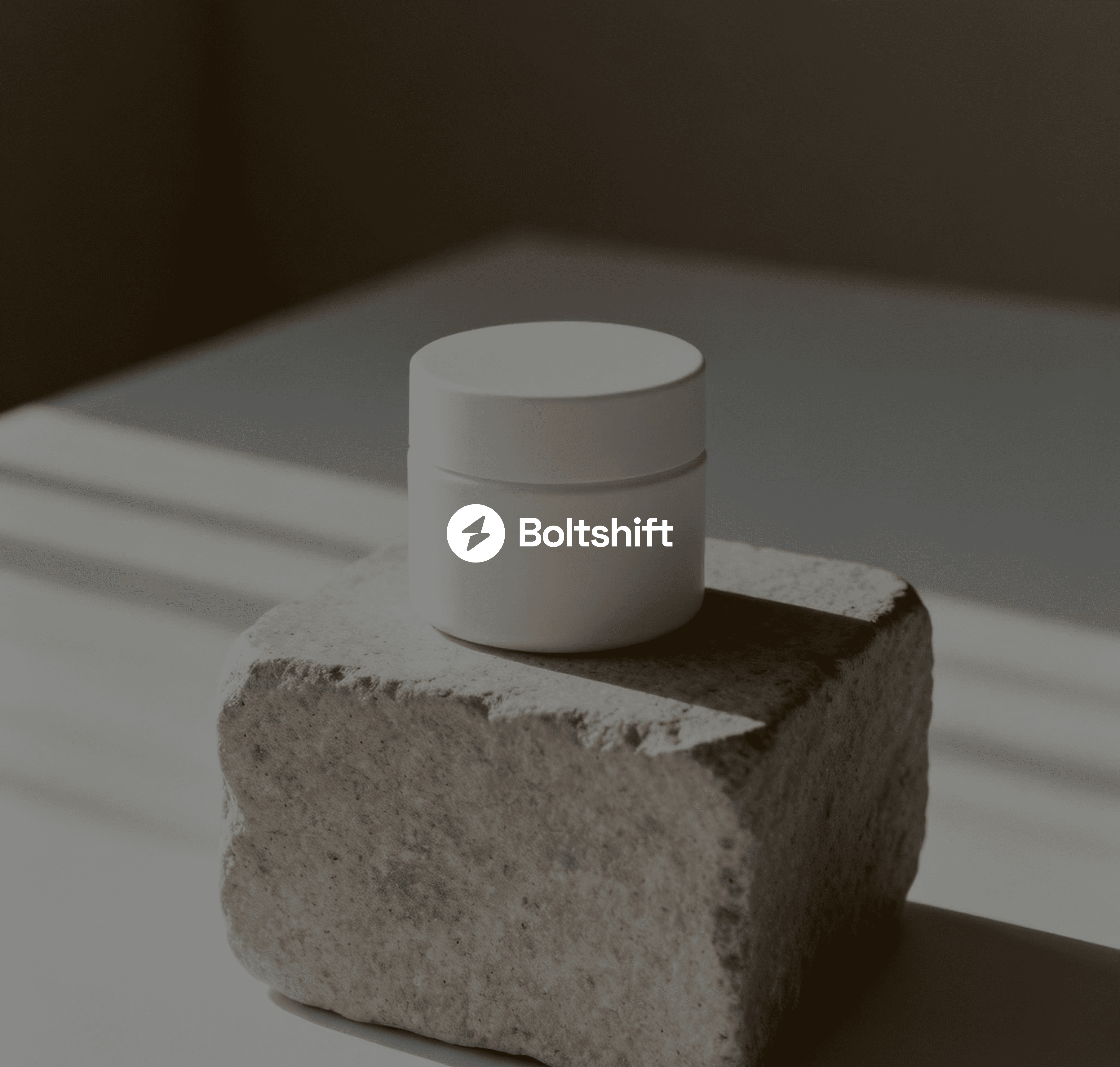 A product placed on top of a rocky object