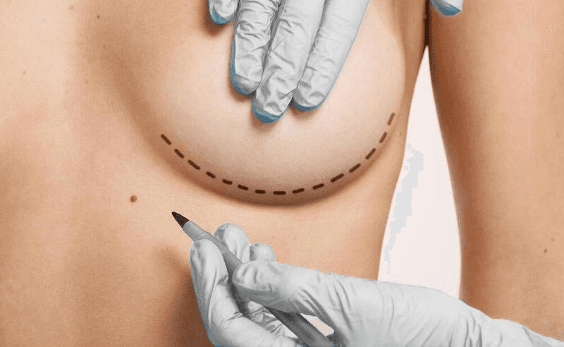 woman smiling wearing denim jacket